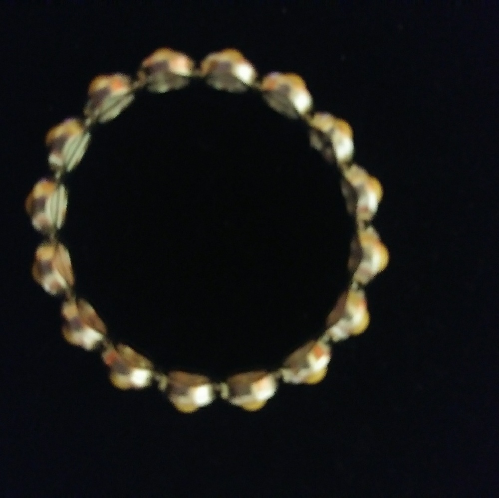 Custom. Gold with beige beaded braclet